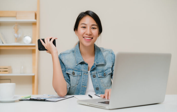 Beautiful smart business Asian woman in smart casual wear workin  Mitra IT | Your Trusted & Reliable Software Solutions